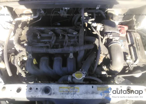 2000 Toyota Echo from USA, damaged, VIN JTDBT1237Y5000427